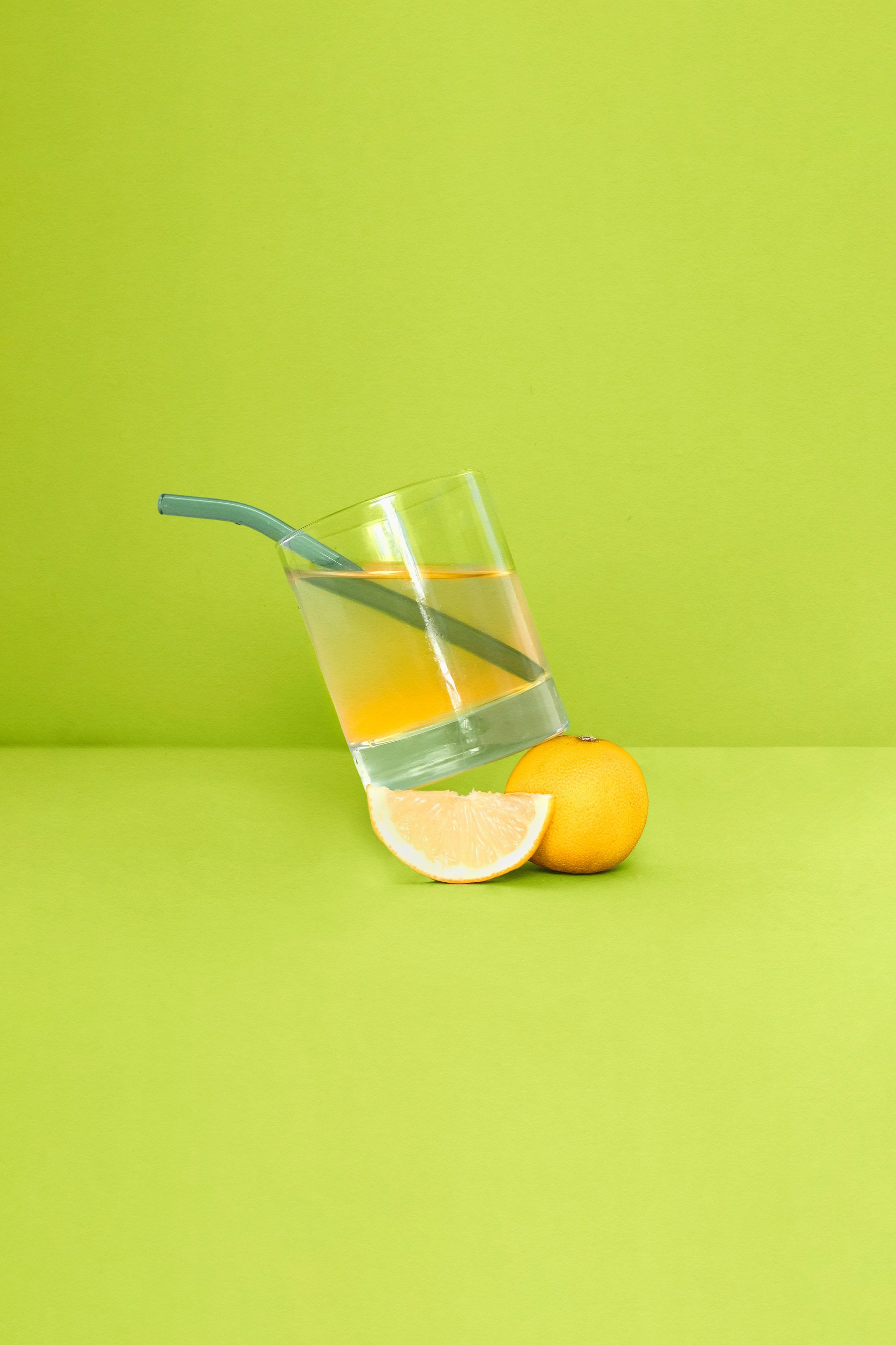 Iced Herbal Tea on Green Background